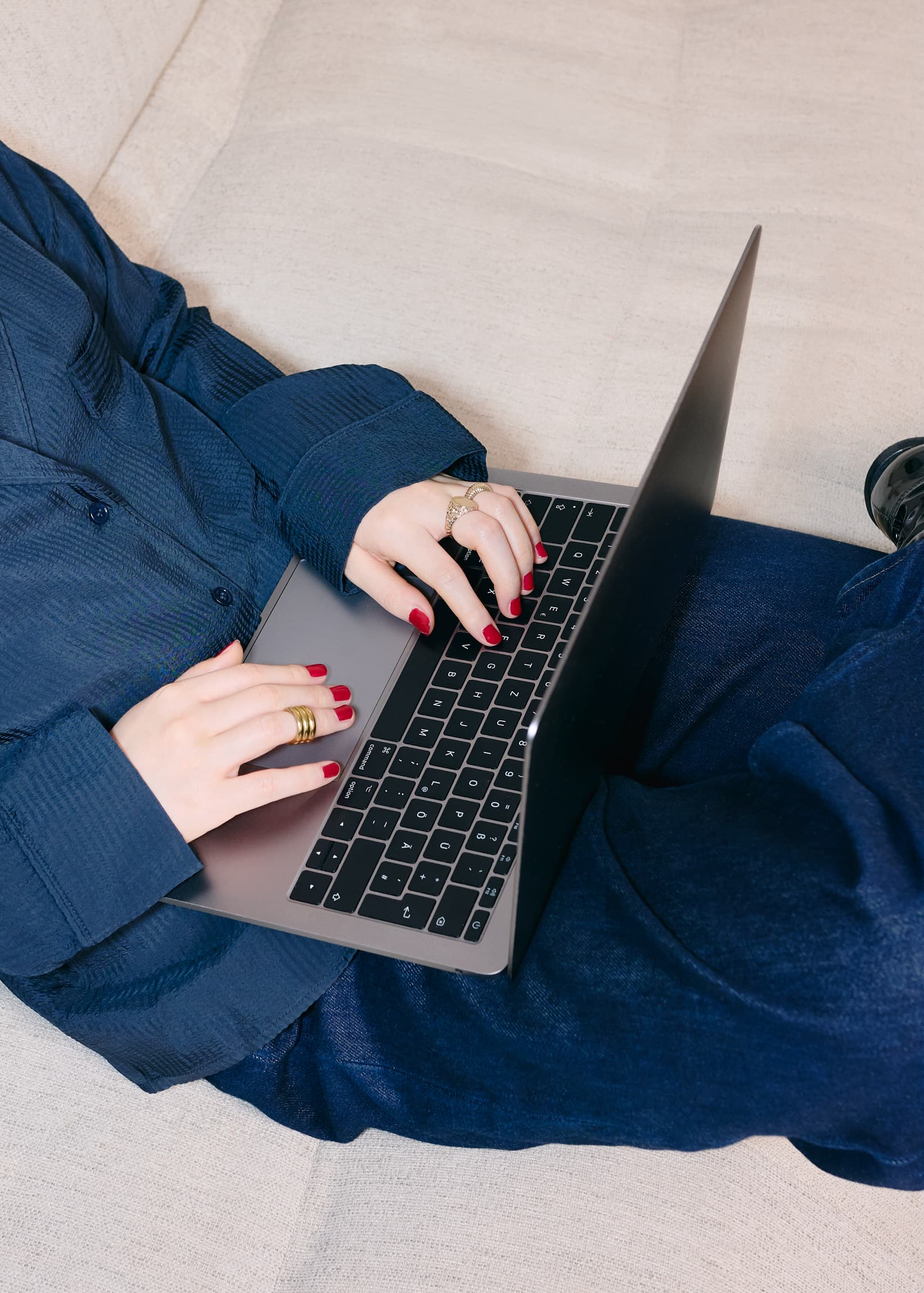 Woman at her desk learning how to train AI to write like you for her business